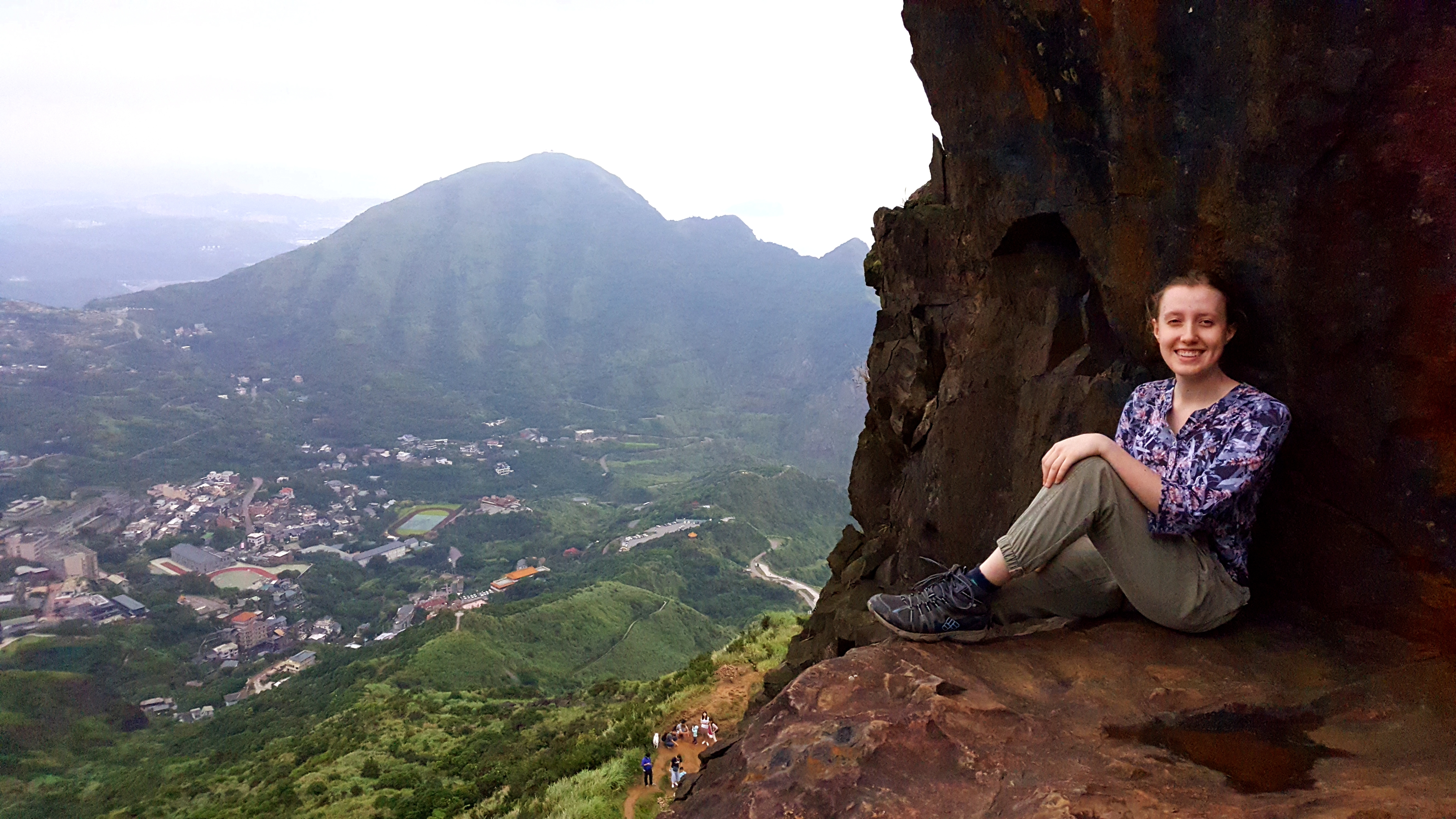 Enjoying the view after hiking Teapot Mountain (無耳茶壺山) in northern Taiwan.