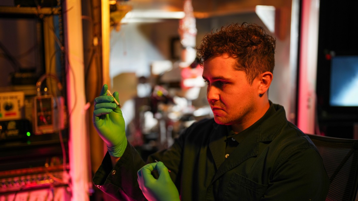 Nathan Reynolds in his lab at JCSMR, the ANU College of Health &amp; Medicine at ANU in Canberra.