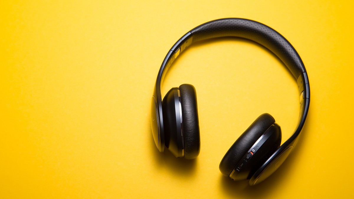 head phones on bright yellow background