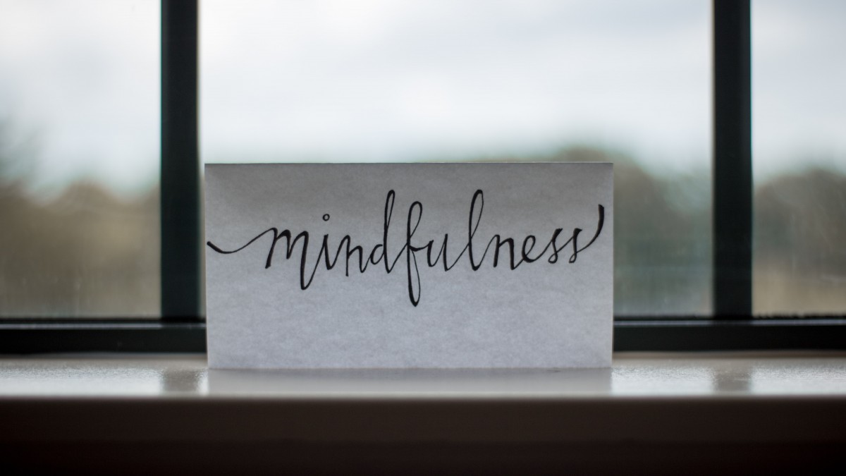 Sign on a windowsill saying mindfulness