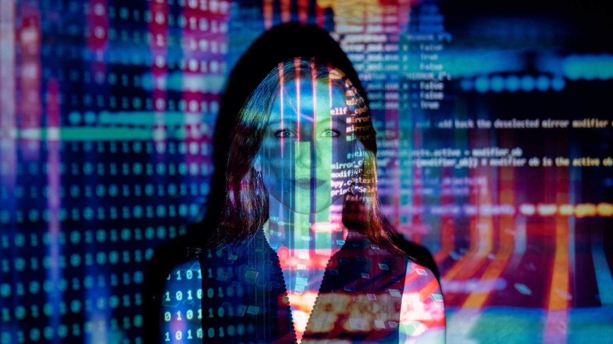 Photo of woman with data coding across image
